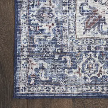 10' Blue and Ivory Floral Power Loom Distressed Washable Runner Rug