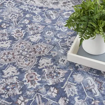 10' Blue and Ivory Floral Power Loom Distressed Washable Runner Rug