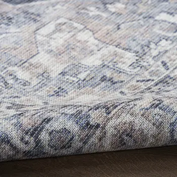 9' X 12' Blue and Ivory Floral Power Loom Distressed Washable Area Rug