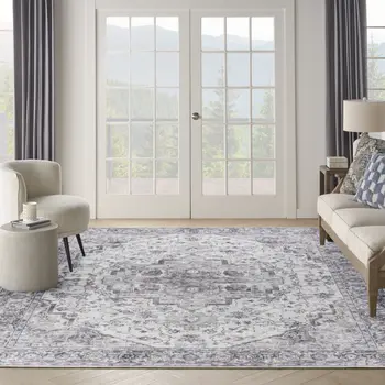 9' X 12' Beige and Ivory Floral Power Loom Distressed Washable Area Rug