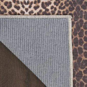 5' X 7' Brown and Ivory Leopard Print Power Loom Washable Non Skid Area Rug