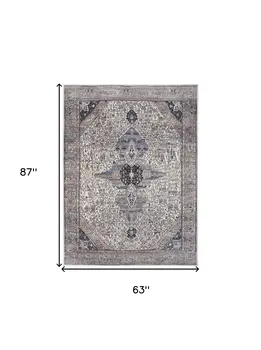 5' X 7' Ivory and Blue Oriental Power Loom Distressed Washable Non Skid Area Rug