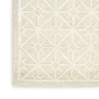5' X 7' Brown and Ivory Geometric Hand Tufted Area Rug