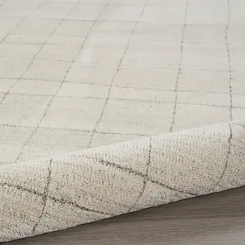 5' X 7' Gray And Ivory Abstract Area Rug