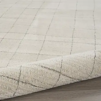 5' X 7' Gray And Ivory Abstract Area Rug