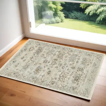 3' X 5' Beige and Blue Oriental Power Loom Distressed Area Rug With Fringe