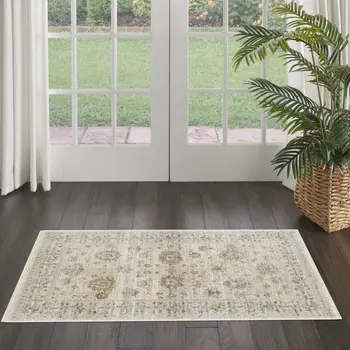 3' X 5' Beige and Ivory Oriental Power Loom Distressed Area Rug With Fringe