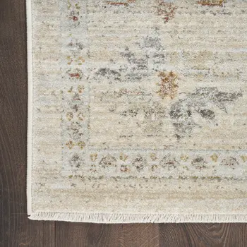 3' X 5' Beige and Ivory Oriental Power Loom Distressed Area Rug With Fringe