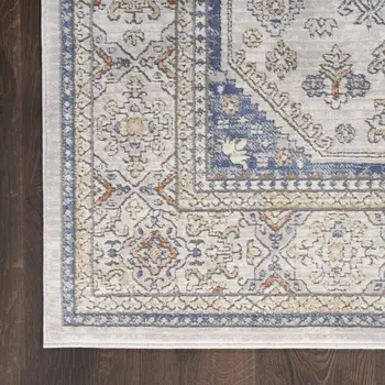 7' X 9' Blue and Gray Medallion Power Loom Area Rug