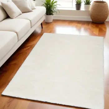 5' X 7' Ivory Shag Power Loom Area Rug