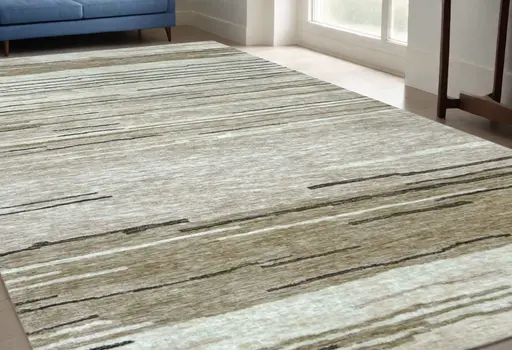 5' X 8' Beige and Brown Abstract Power Loom Distressed Non Skid Area Rug