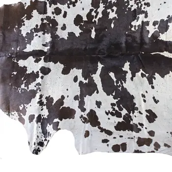 5' X 7' Brown and White Cowhide Hand Knotted Area Rug