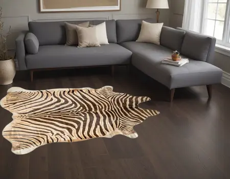 5' X 7' Beige and Brown Cowhide Hand Knotted Area Rug