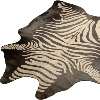 5' X 7' Black and Off White Cowhide Hand Knotted Area Rug