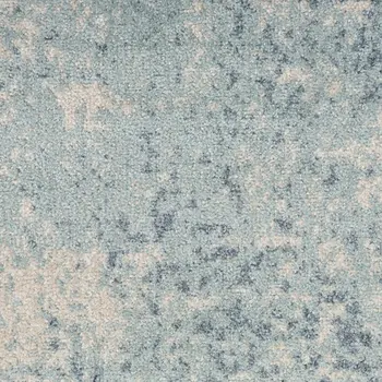 5' X 7' Blue and Ivory Abstract Power Loom Washable Area Rug