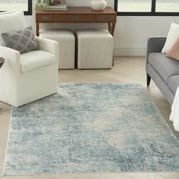 5' X 7' Blue and Ivory Abstract Power Loom Washable Area Rug