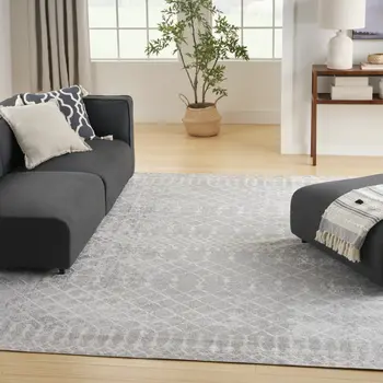 9' X 12' Blue and Ivory Abstract Power Loom Washable Area Rug