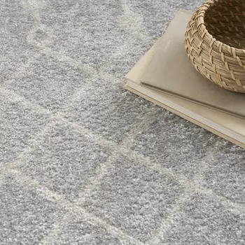 9' X 12' Blue and Ivory Abstract Power Loom Washable Area Rug