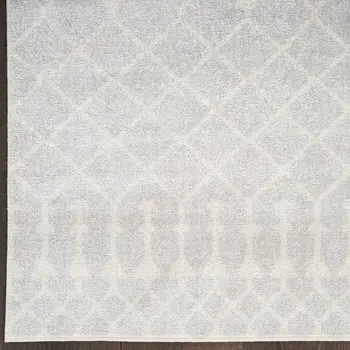 9' X 12' Blue and Ivory Abstract Power Loom Washable Area Rug