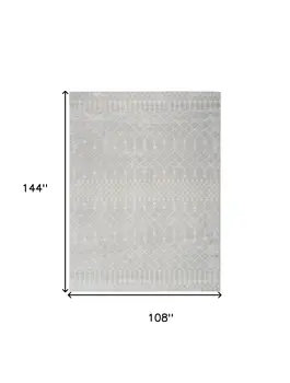 9' X 12' Blue and Ivory Abstract Power Loom Washable Area Rug