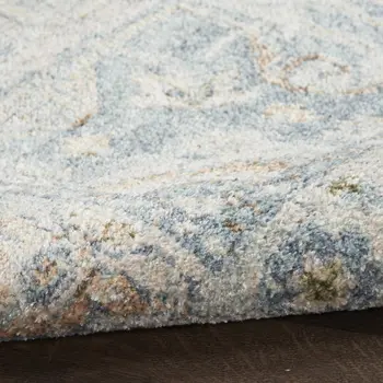 9' X 12' Blue and Ivory Floral Medallion Power Loom Distressed Washable Area Rug