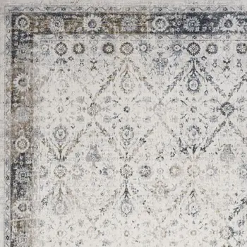 9' X 12' Blue and Ivory Floral Medallion Power Loom Distressed Washable Area Rug