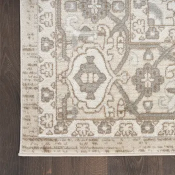 5' X 7' Beige and Ivory Medallion Power Loom Distressed Area Rug