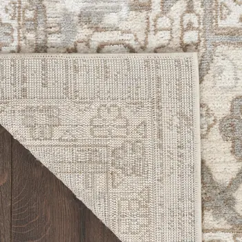 5' X 7' Beige and Ivory Medallion Power Loom Distressed Area Rug