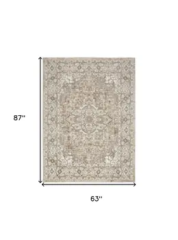 5' X 7' Beige and Ivory Medallion Power Loom Distressed Area Rug
