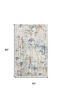4' X 6' Beige and Blue Abstract Power Loom Area Rug