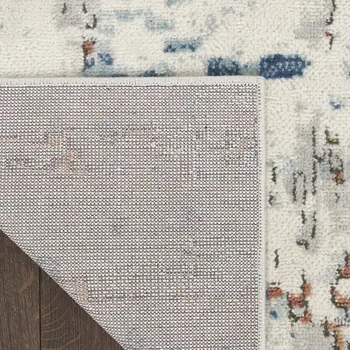 5' X 7' Beige and Blue Abstract Power Loom Area Rug