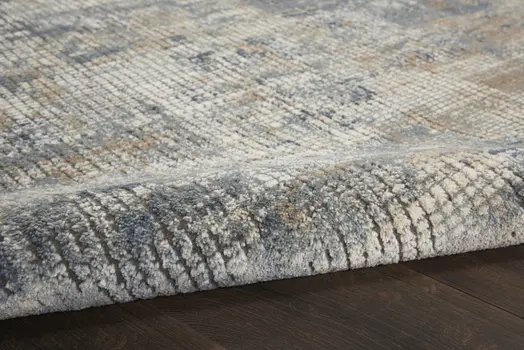 7' X 10' Beige and Blue Abstract Power Loom Distressed Area Rug