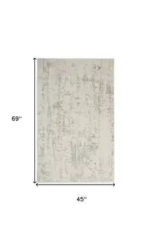 4' X 6' Gray and Ivory Abstract Power Loom Area Rug