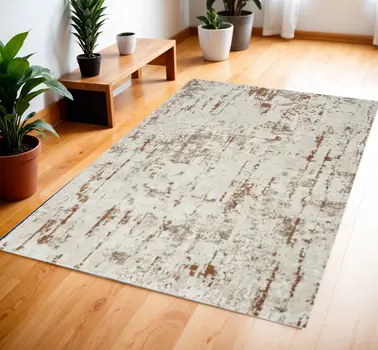 4' X 6' Red and Ivory Abstract Power Loom Area Rug