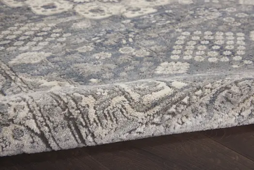 7' X 10' Gray and Ivory Medallion Power Loom Area Rug