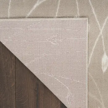 5' X 7' Beige and Ivory Floral Power Loom Area Rug