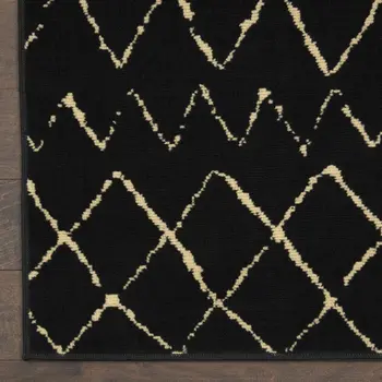 7' X 10' Black and Ivory Abstract Power Loom Distressed Area Rug