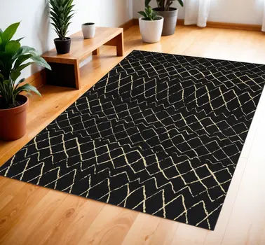 4' X 6' Black and Ivory Abstract Power Loom Distressed Area Rug
