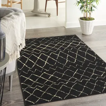 4' X 6' Black and Ivory Abstract Power Loom Distressed Area Rug