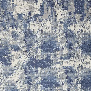 5' X 7' Blue and Ivory Abstract Power Loom Area Rug