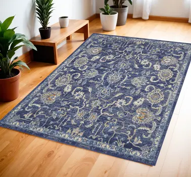 4' X 6' Blue and Beige Floral Power Loom Area Rug