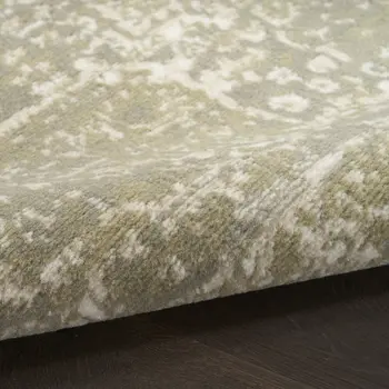 5' X 7' Green and Ivory Medallion Power Loom Distressed Area Rug