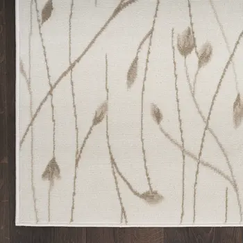 8' X 10' Beige and Ivory Floral Power Loom Area Rug