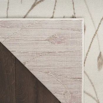 8' X 10' Beige and Ivory Floral Power Loom Area Rug