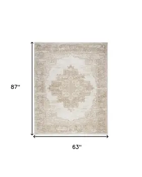 5' X 7' Beige and Ivory Medallion Power Loom Distressed Area Rug