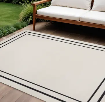 9' X 12' Ivory And Black Indoor Outdoor Area Rug