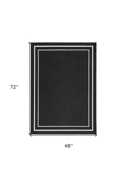 4' X 6' Black And Ivory Indoor Outdoor Area Rug