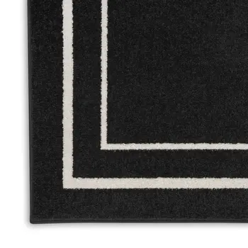 8' X 10' Black And Ivory Indoor Outdoor Area Rug