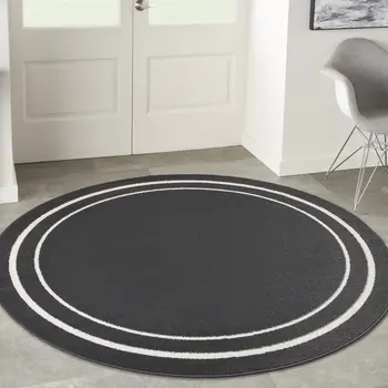 8' Black And Ivory Round Indoor Outdoor Area Rug