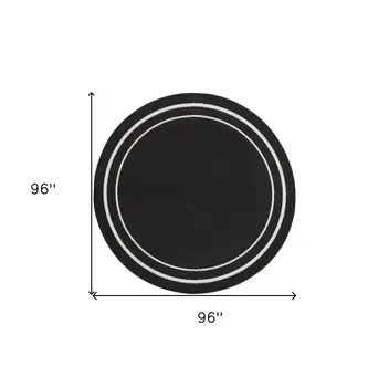 8' Black And Ivory Round Indoor Outdoor Area Rug